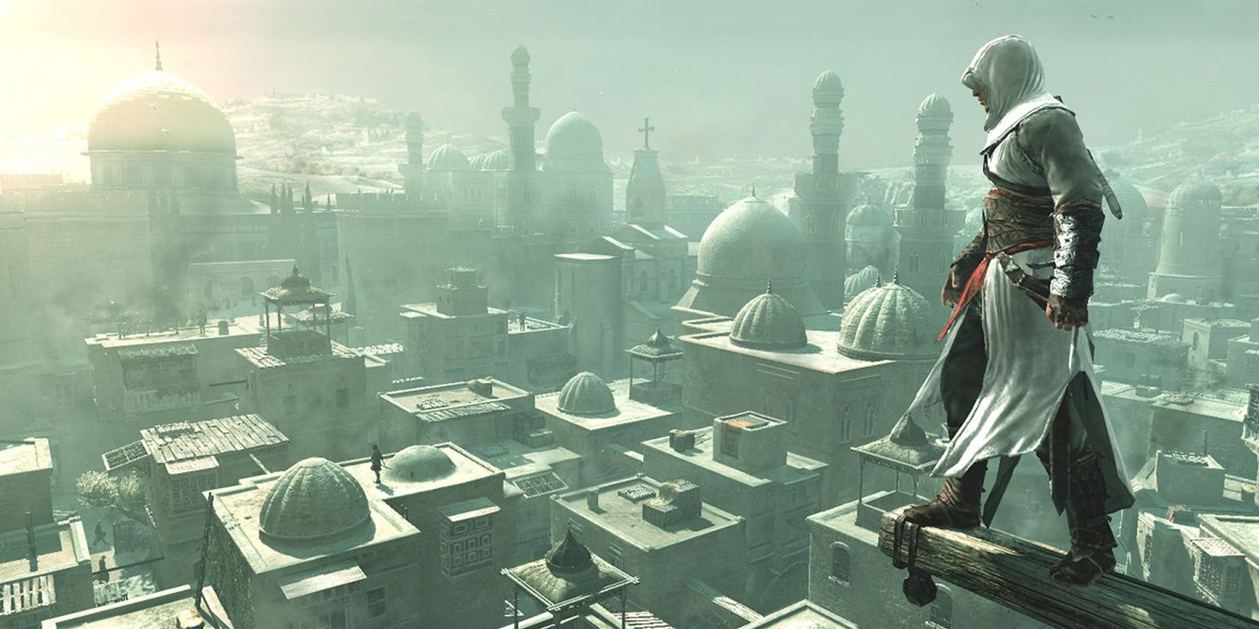 Assassin's Creed 1 protagonist Altair overlooking a city in the Holy Land.