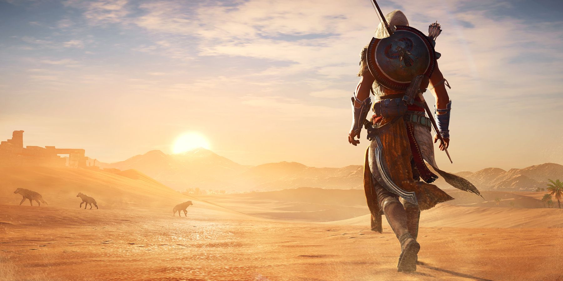 Protagonist Bayek walking towards the desert during the sunset in Assassins Creed Origins.