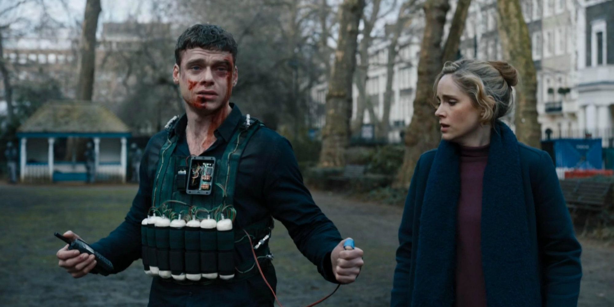 David with a bomb strapped to his chest as Vicky looks on in Bodyguard