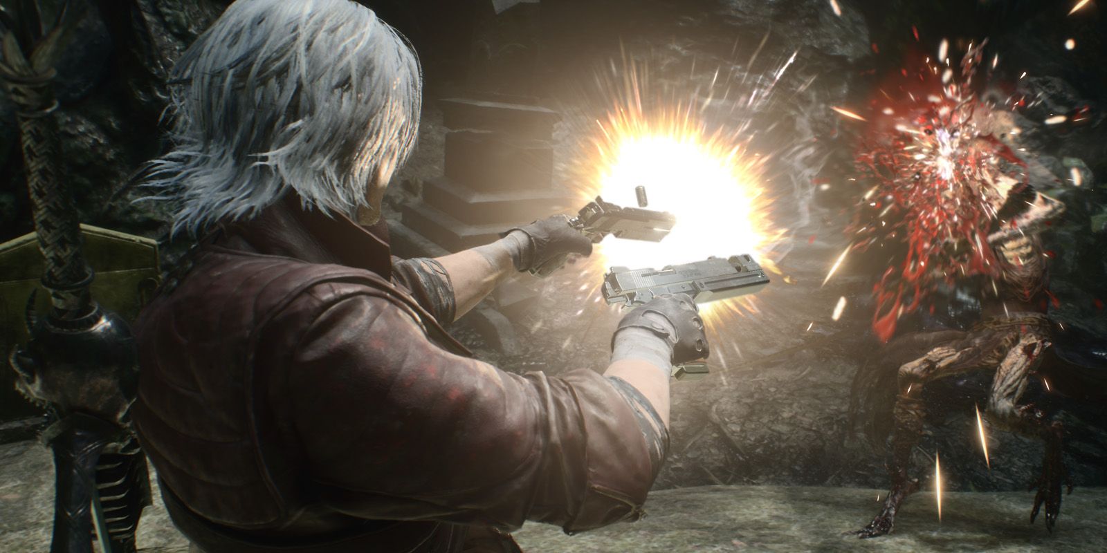 A man fires two pistols at a demon in Devil May Cry 5