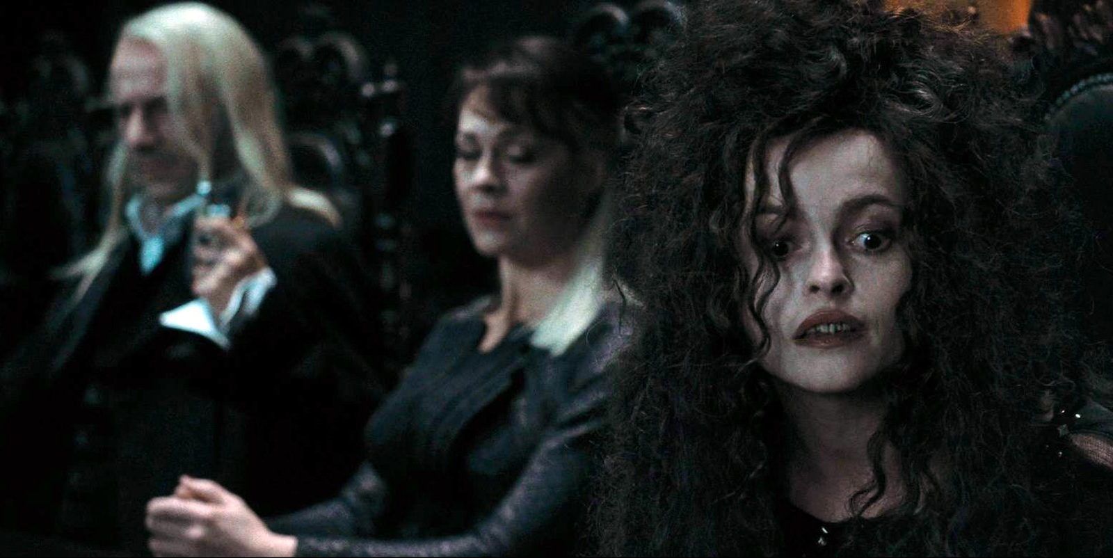 Bellatrix looking interested in front of Lucius and Narcissa