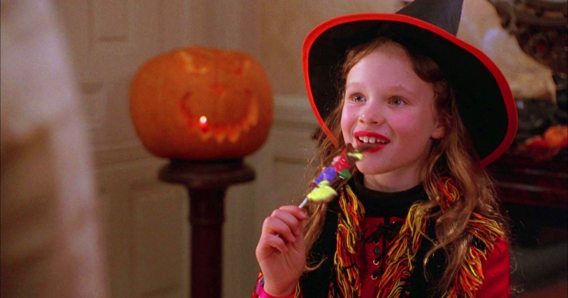 Hocus Pocus - Dani eating a lollipop on Halloween 
