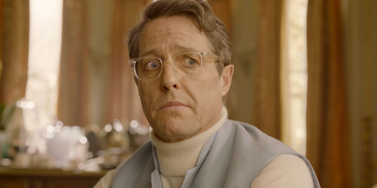 Hugh Grant looking concerned in Paddington 2