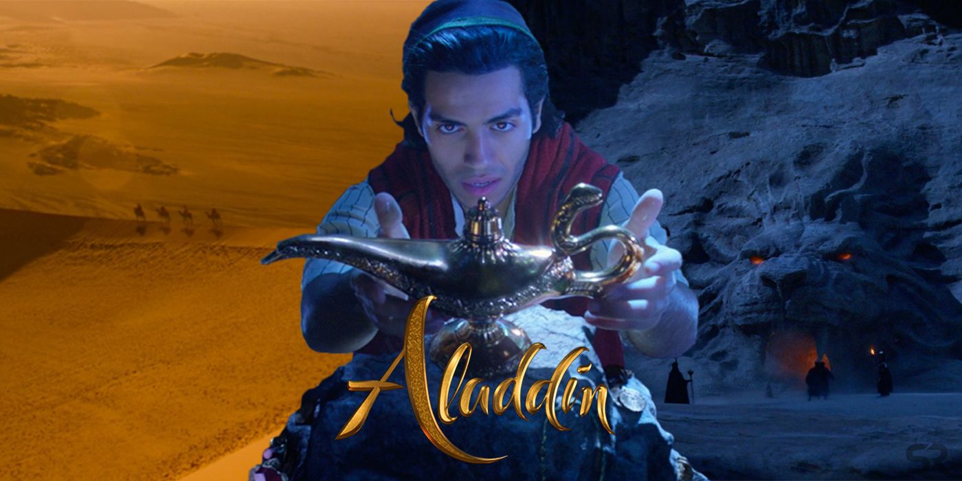 Mena Massoud as Aladdin with lamp, desert, and Cave of Wonder