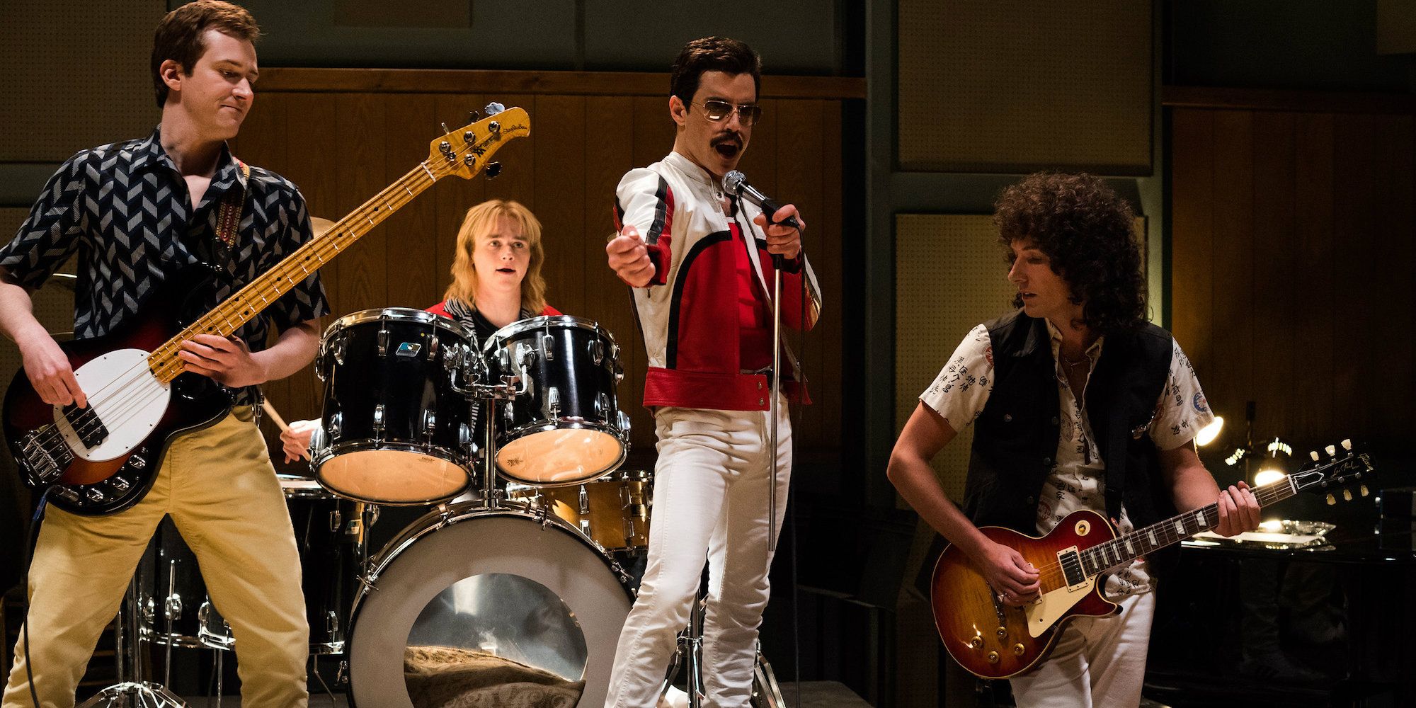 Queen performing in a rehearsal space in Bohemian Rhapsody