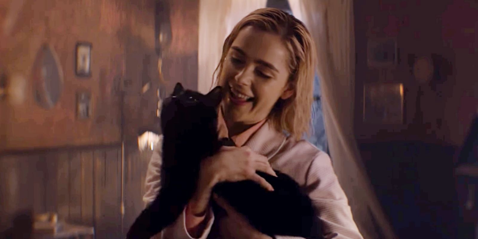 Sabrina cuddles Salem