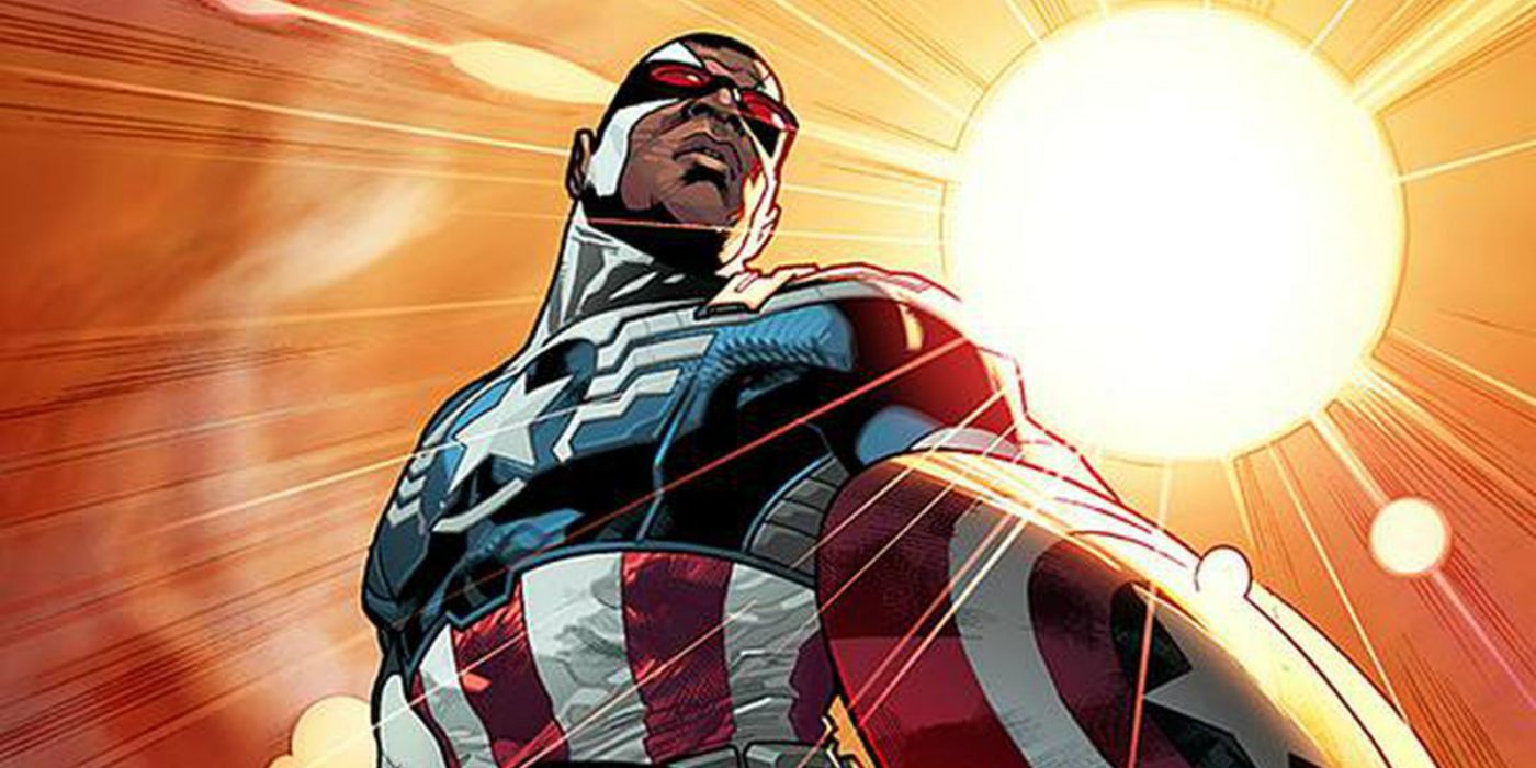 Sam Wilson poses as the new Captain America with the sun shining behind him.