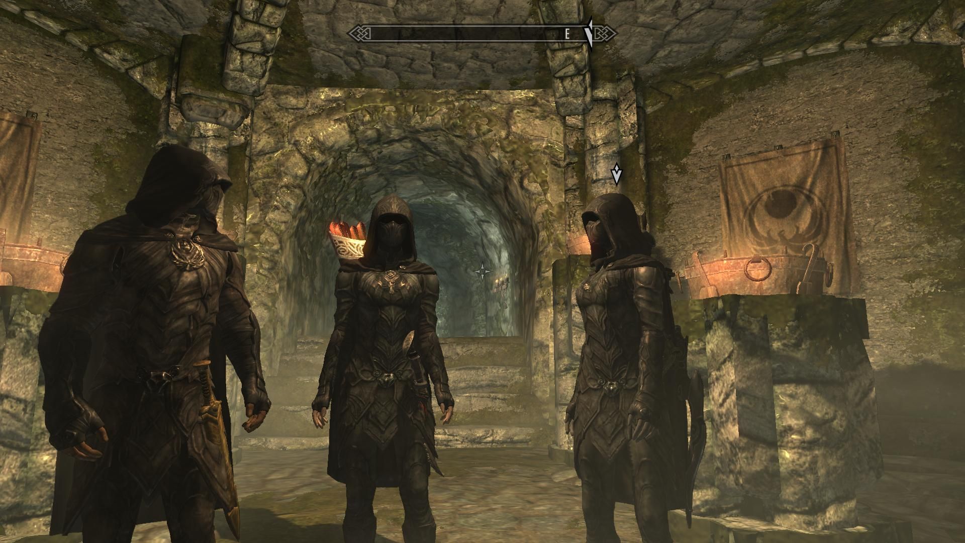 Three members of the Thieves Guild in Skyrim standing around in Nightingale Armor
