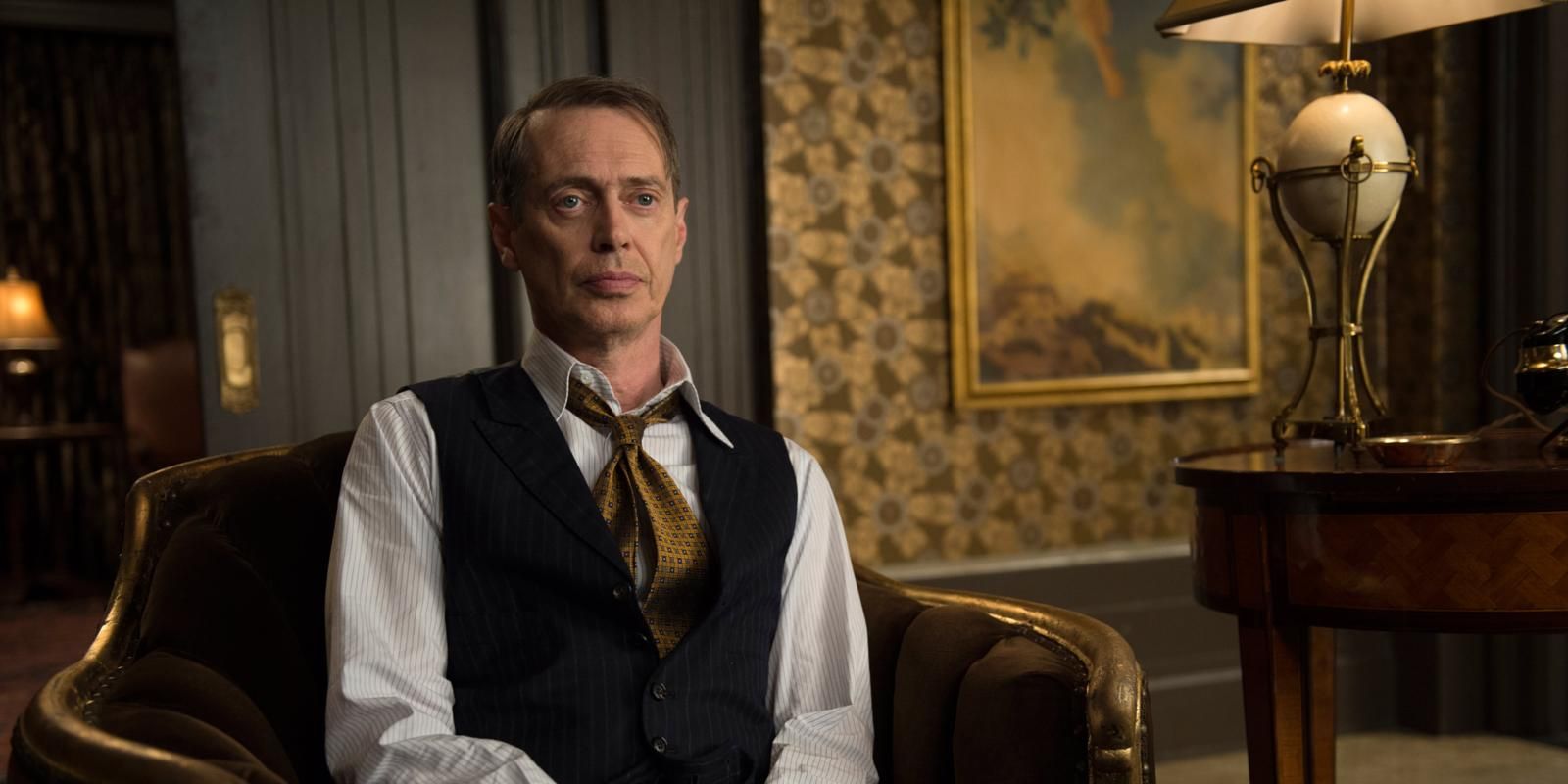 Nucky sitting in a chair on Boardwalk Empire