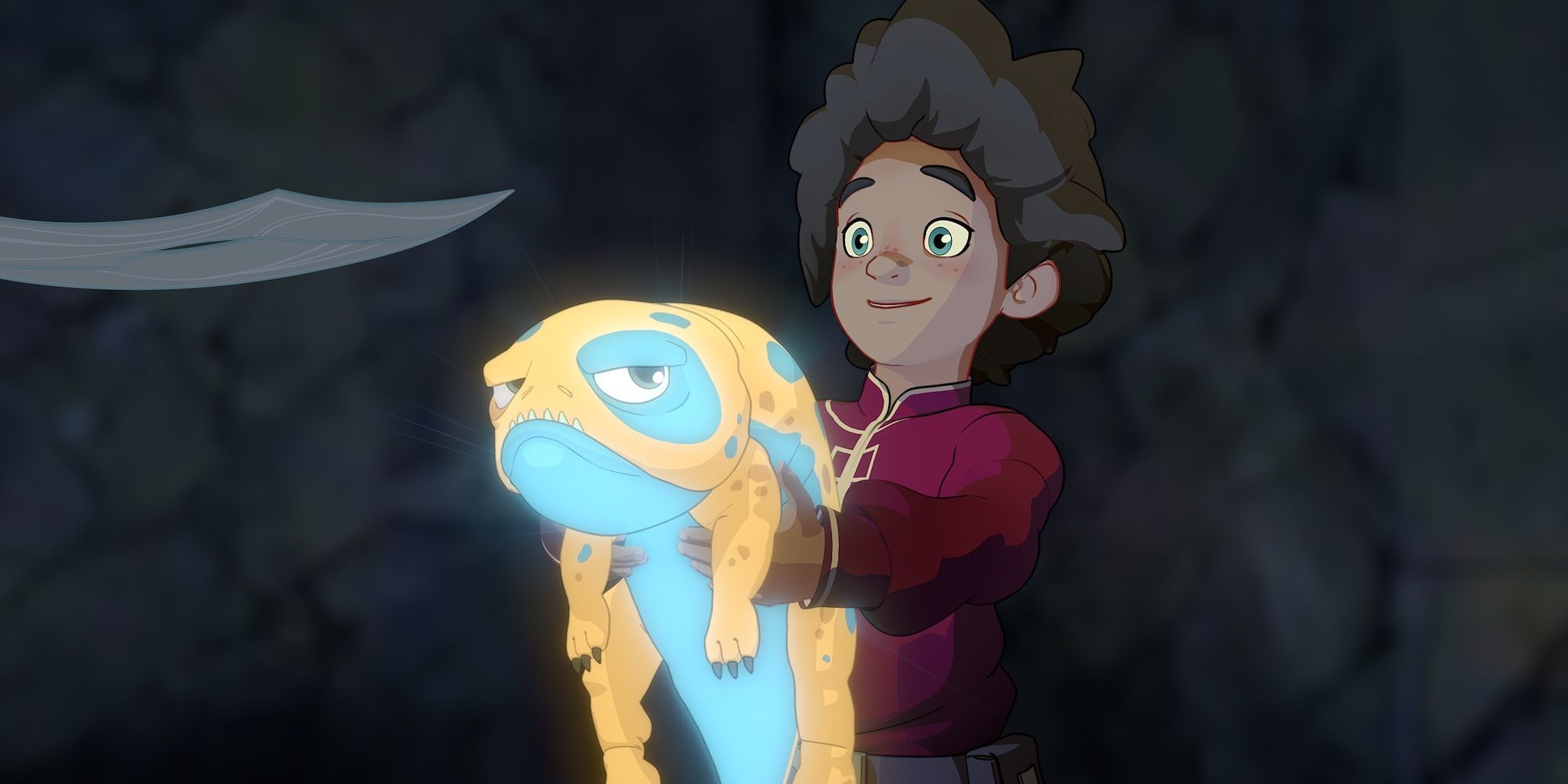 A boy holding a bored creature in his hands in The Dragon Prince