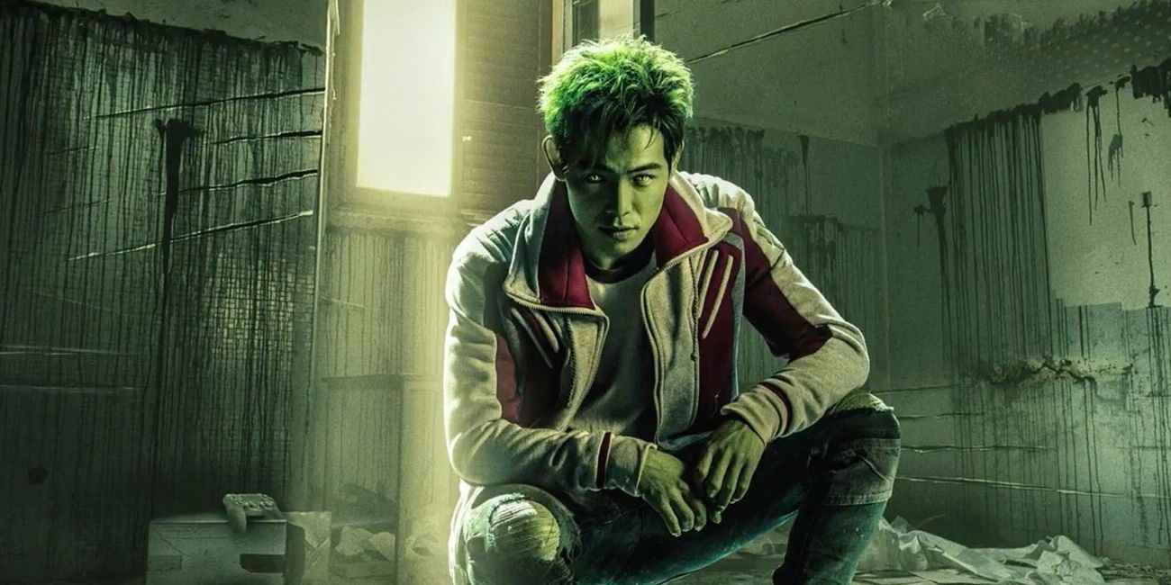 Beast Boy crouches on the ground in Titans.