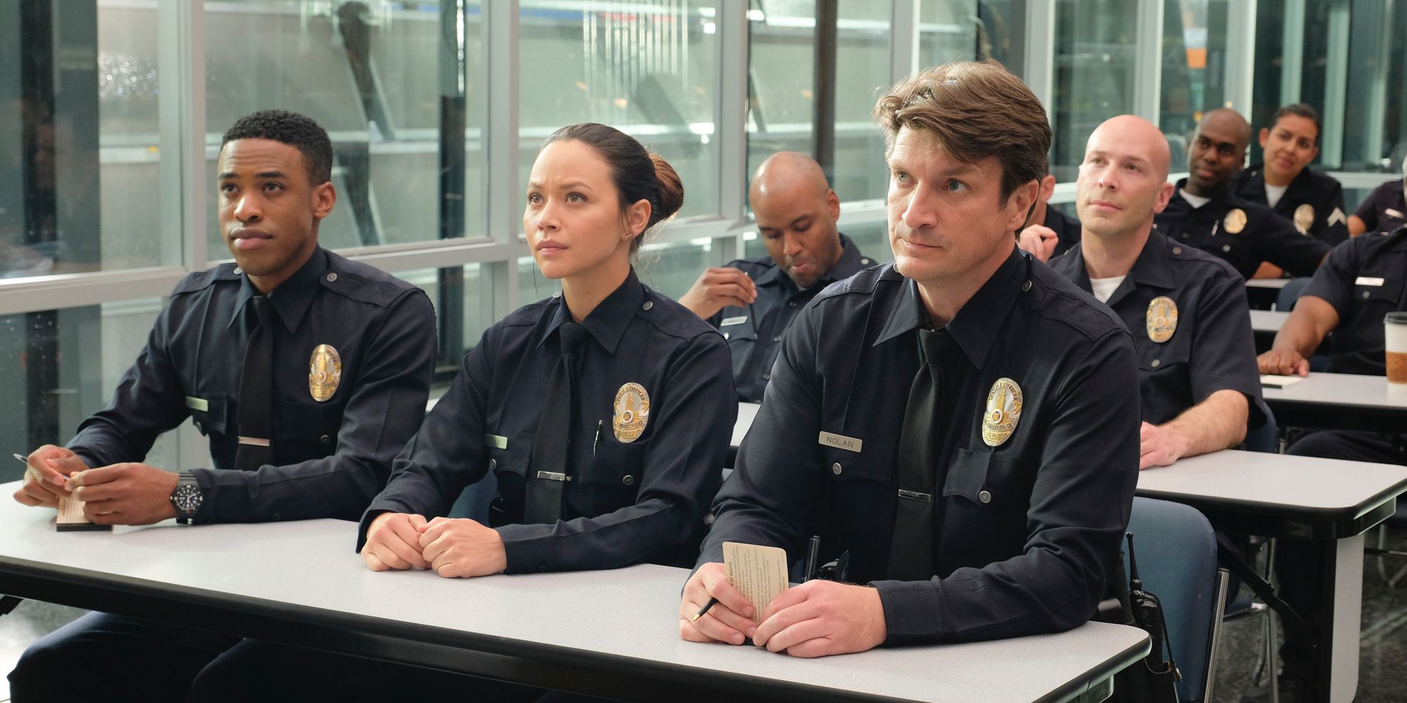 Titus Makin Jr. Melissa O'Neil and Nathan Fillion in The Rookie
