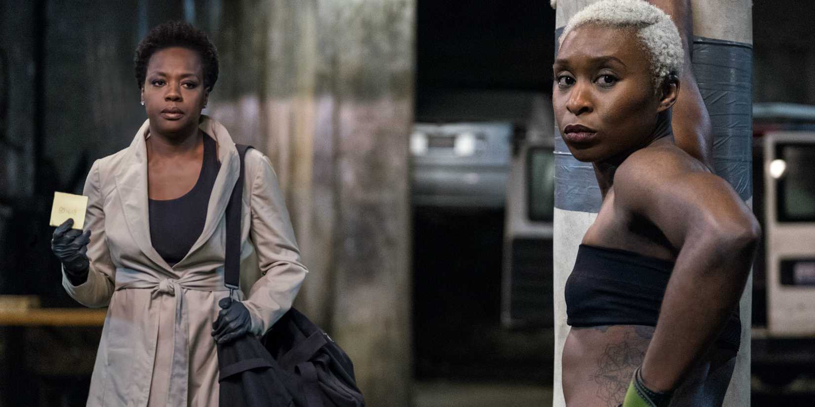 Viola Davis holding up a note and Cynthia Erivo leaning on a punching bag in Widows 2018