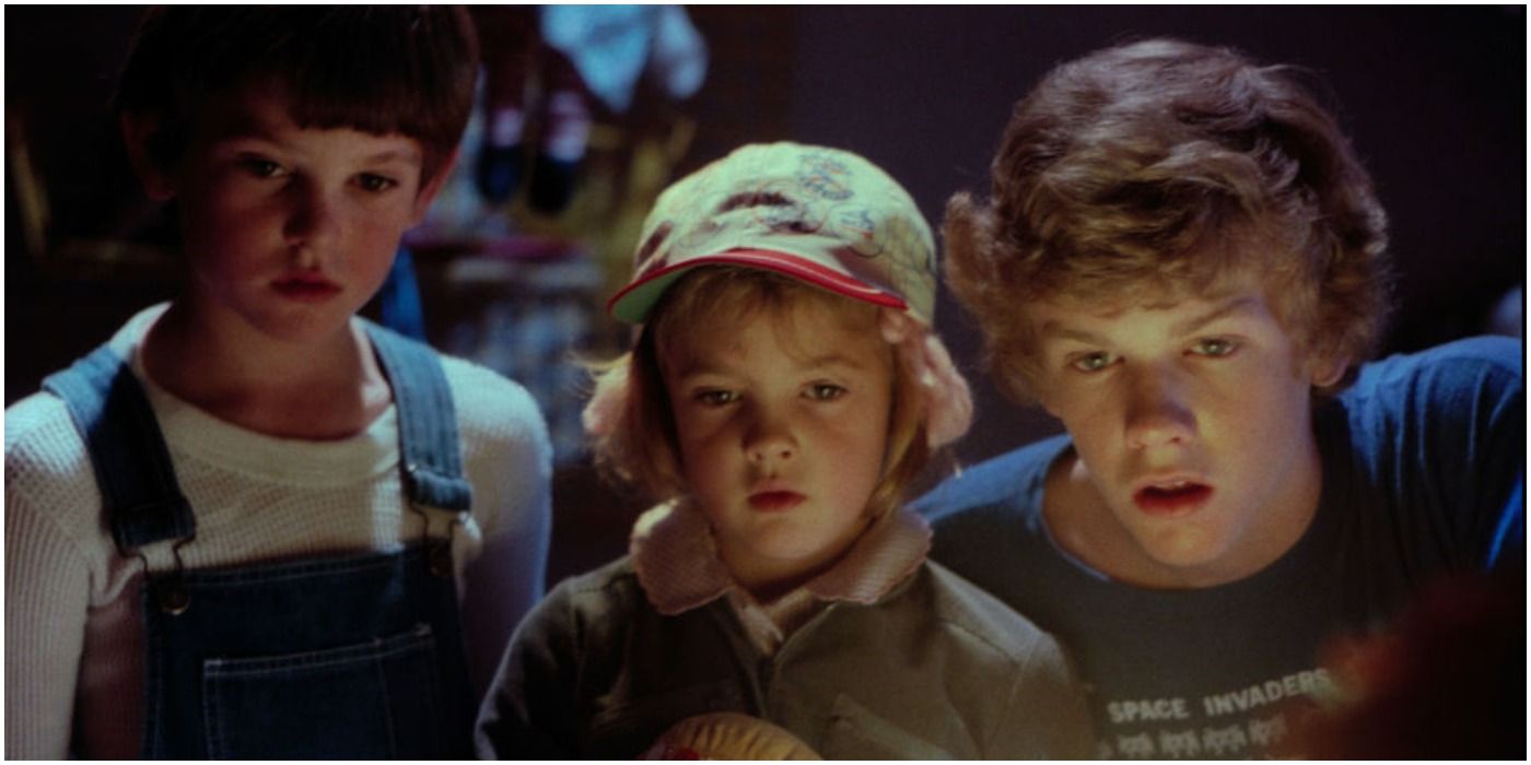 Henry Thomas, Drew Barrymore, and Robert MacNaughton in E.T.