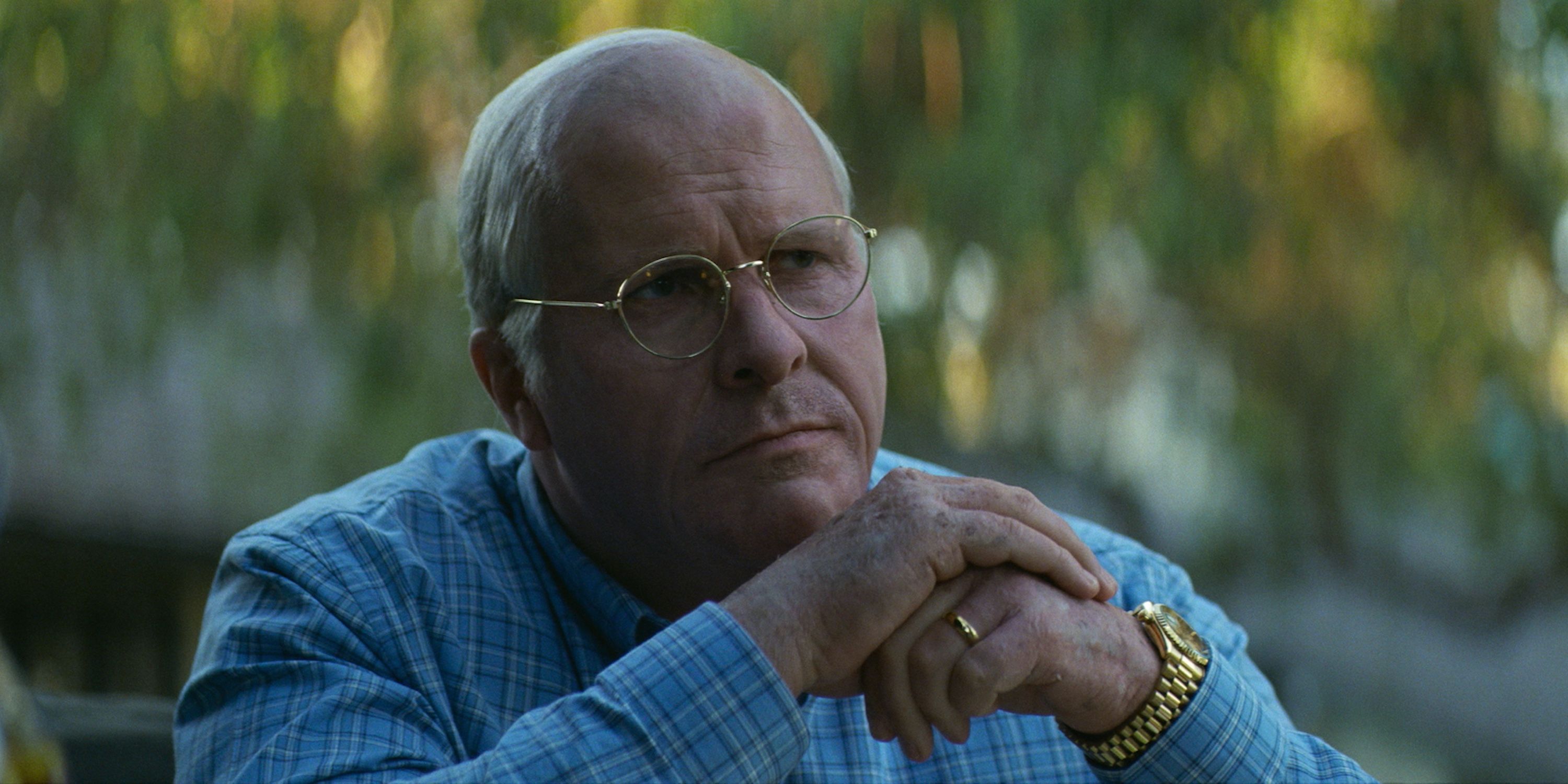 Christian Bale in Vice as Dick Cheney speaking with George W. Bush