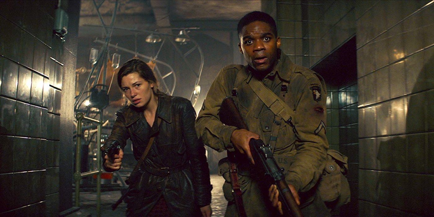 Jovan Adepo and Mathilde Ollivier in Overlord