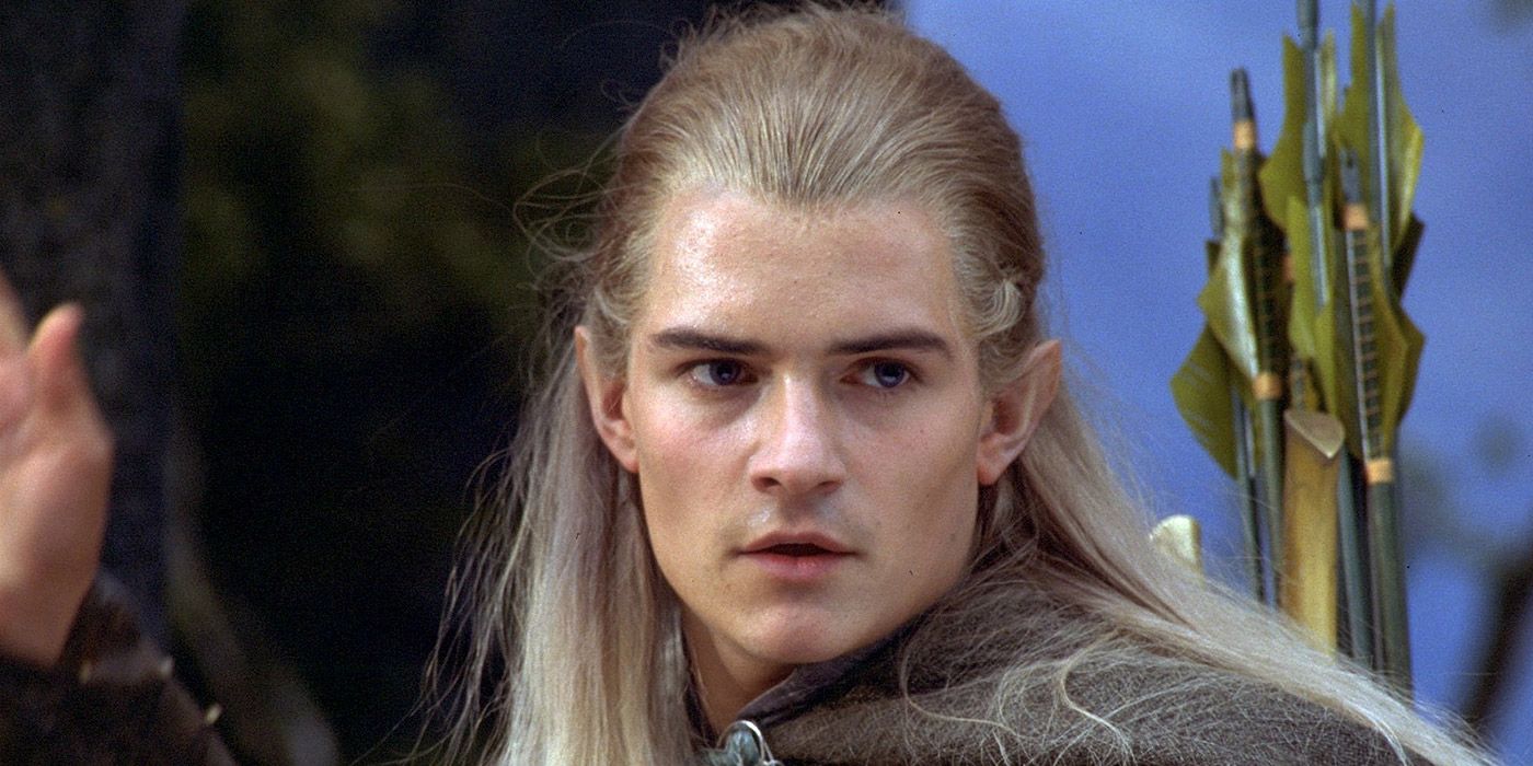 Legolas prepares to draw his bow and arrow in Lord of the Rings