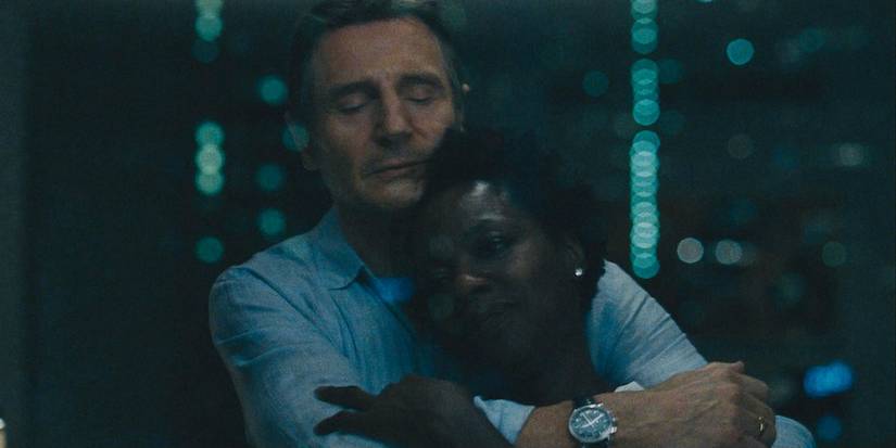 Liam Neeson as Harry and Viola Davis as Veronica embracing in Widows