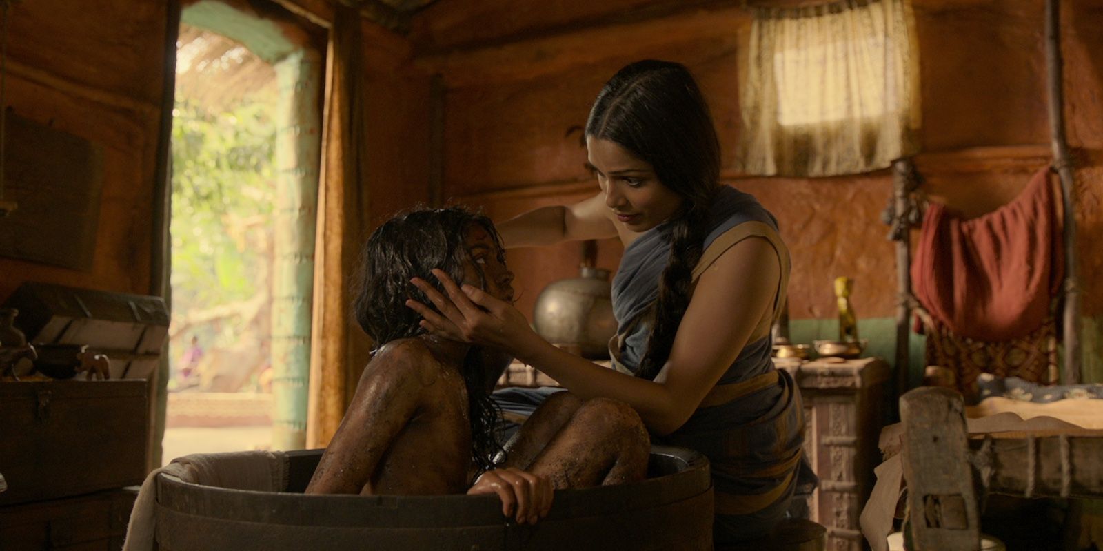 Rohan Chand and Freida Pinto in Mowgli Legend of the Jungle