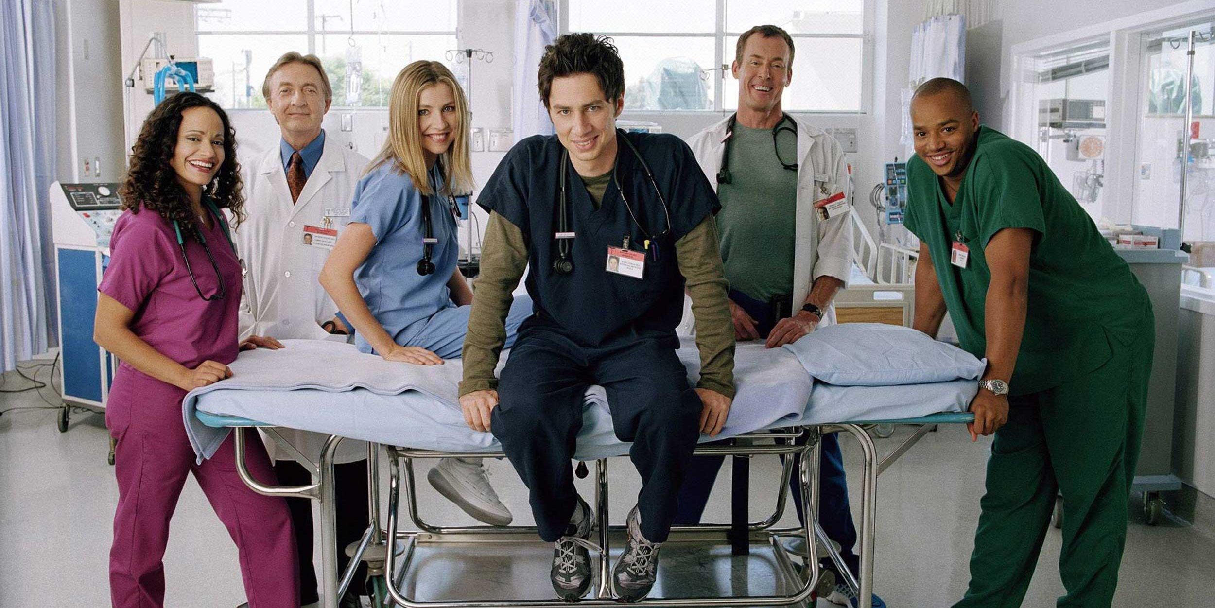 The cast of Scrubs pose for a promotional photo