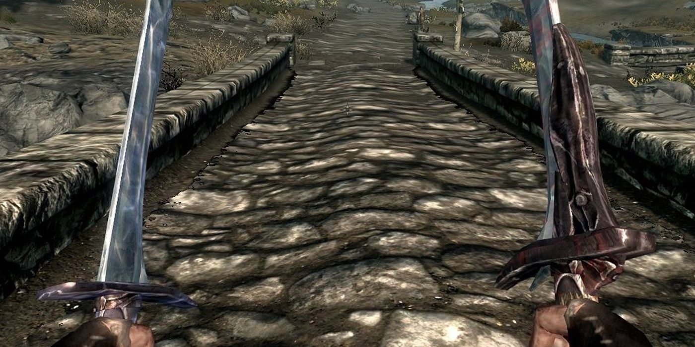 Una perspectiva en primera persona de un jugador con doble empuñadura Soulrender y Bloodscythe en Skyrim