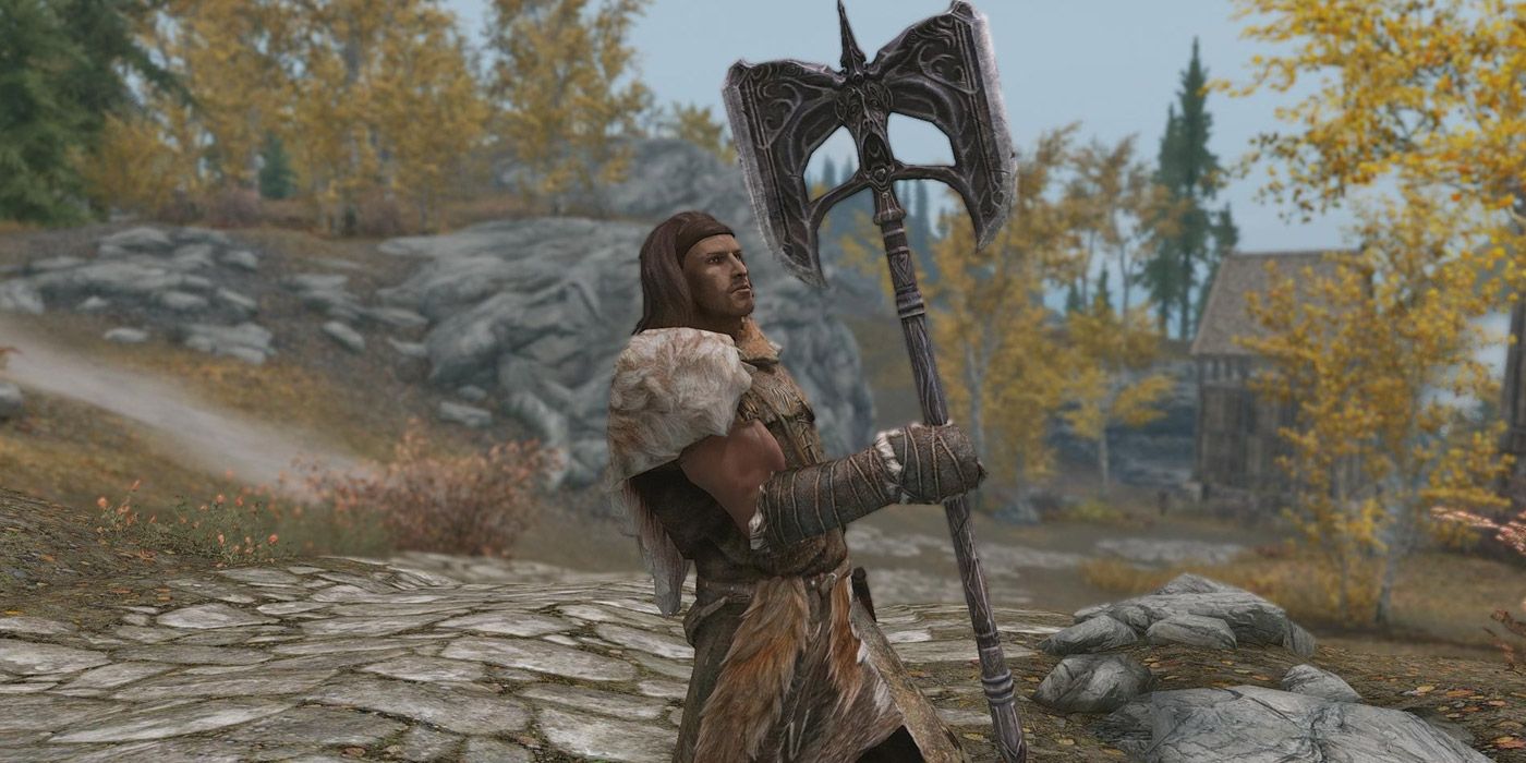 A male human player holding Wuuthrad in Skyrim.