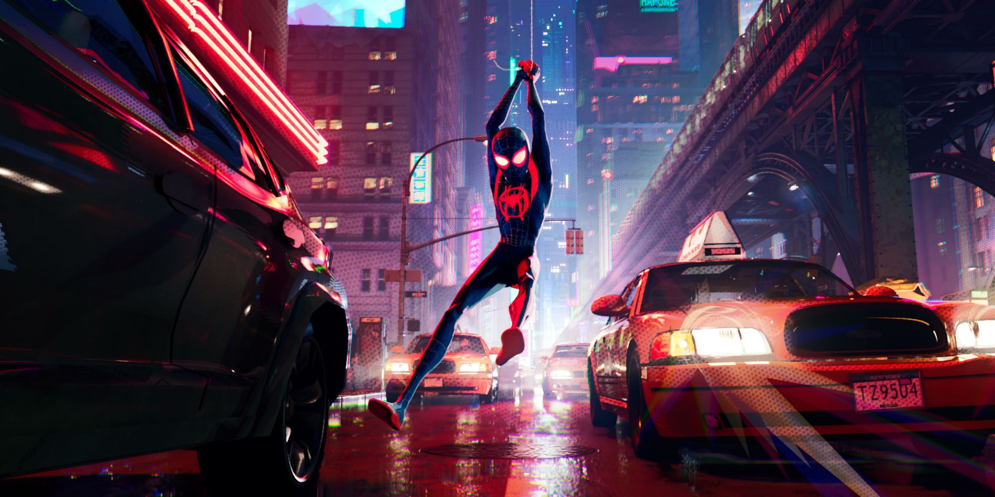 Spider-Man swinging through the streets in Spider-Man: Into the Spider-Verse.