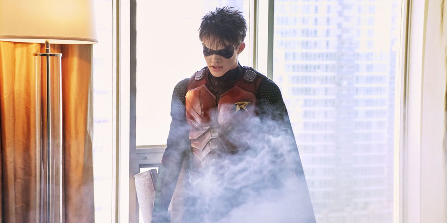 Jason Todd stands in smoke in Titans