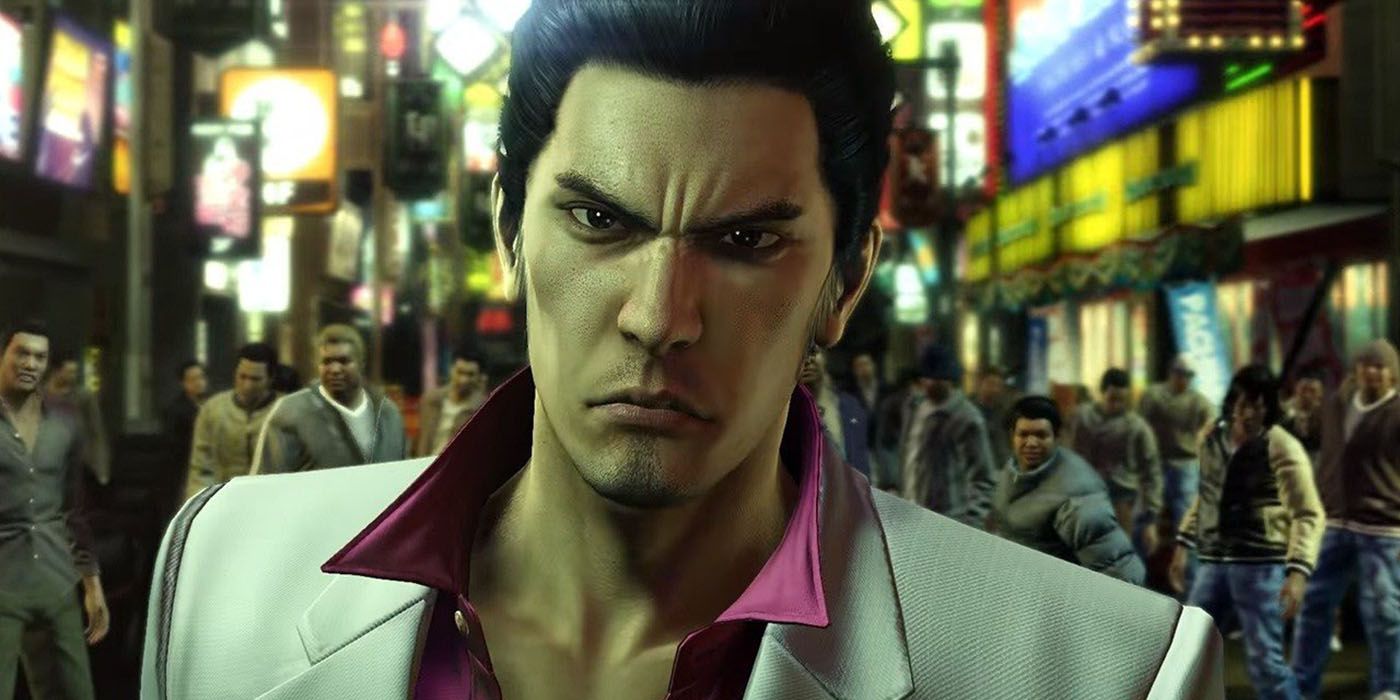 Close up of a male, angry-looking character in a crowded street in Yakuza Kiwami 