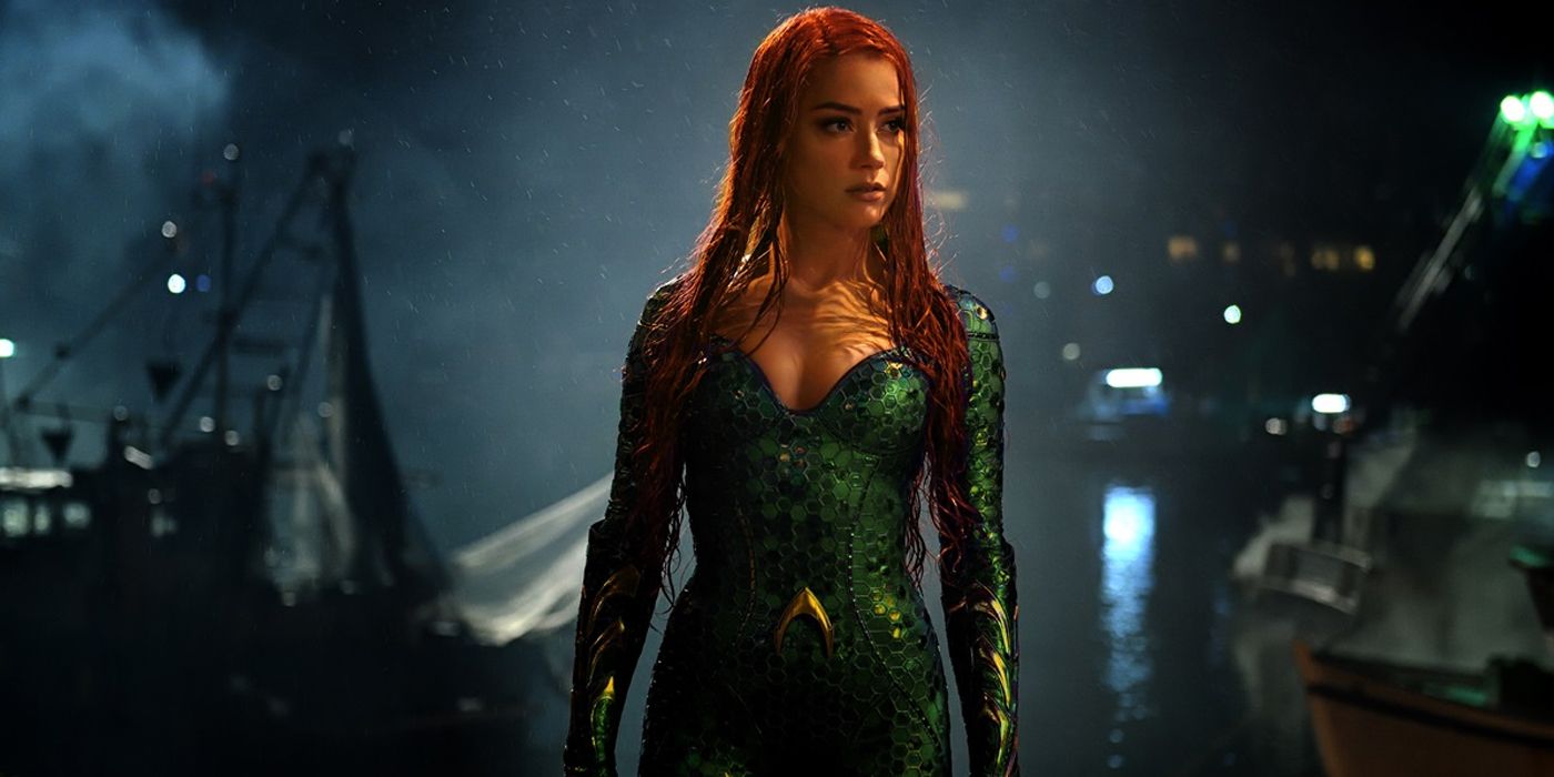 Amber Heard as Mera in green suit in Aquaman