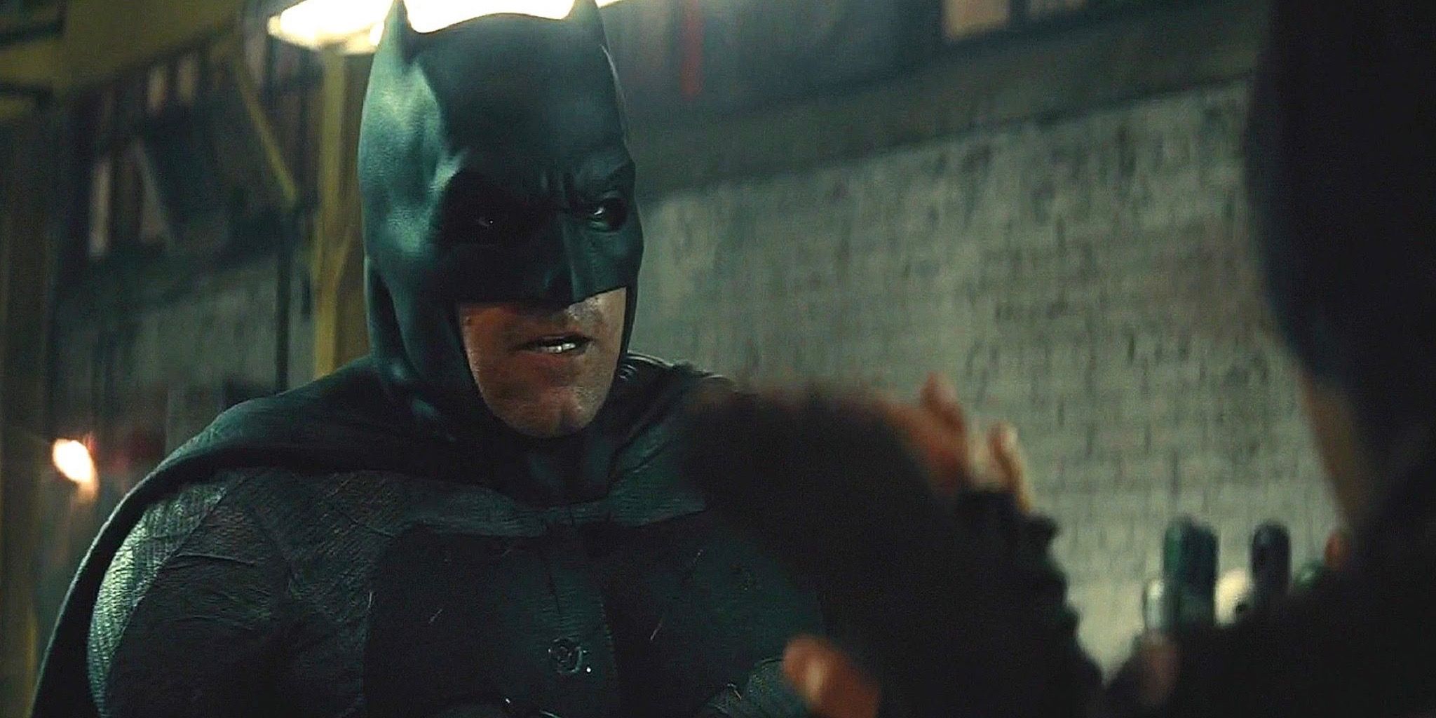 Batman preparing to fight in the warehouse in Batman v Superman
