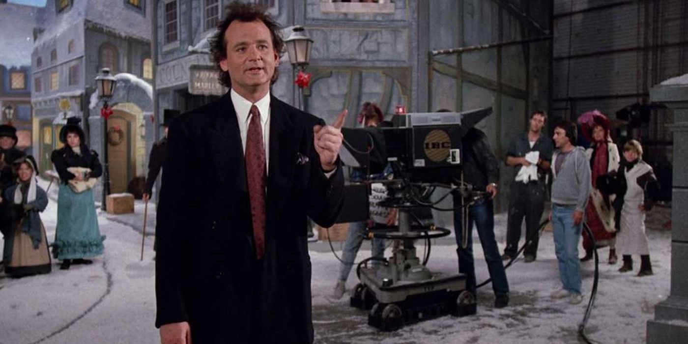 Bill Murray standing on a movie set in Scrooged