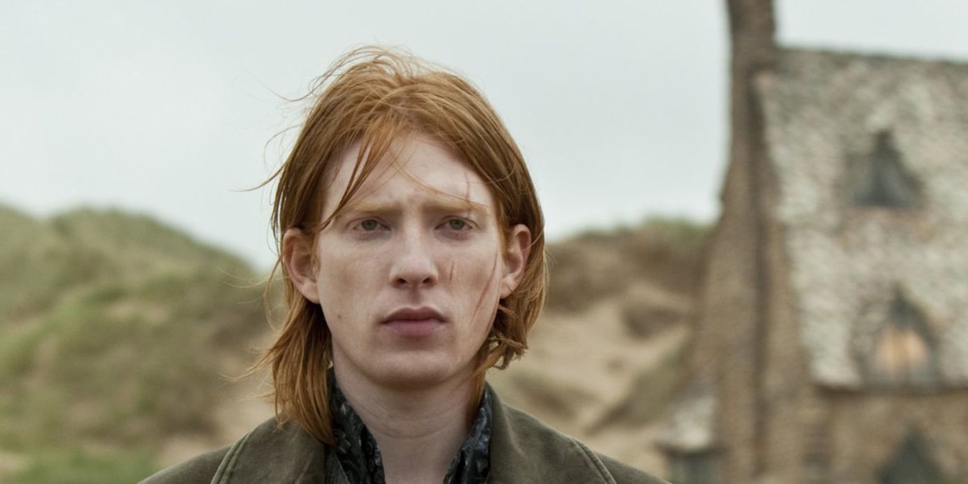 Bill Weasley standing outside his home.