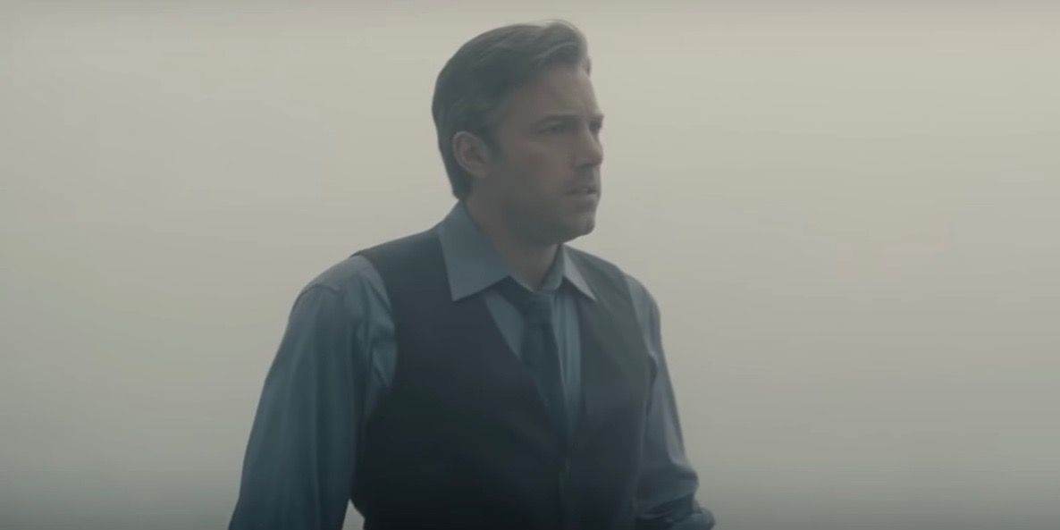 Ben Affleck runs through fog in Batman V Superman: Dawn of Justice