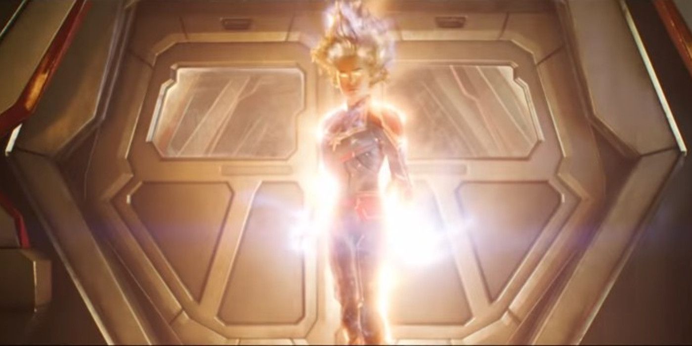 Brie Larson as Carol Danvers covered in a yellow glow in Captain Marvel