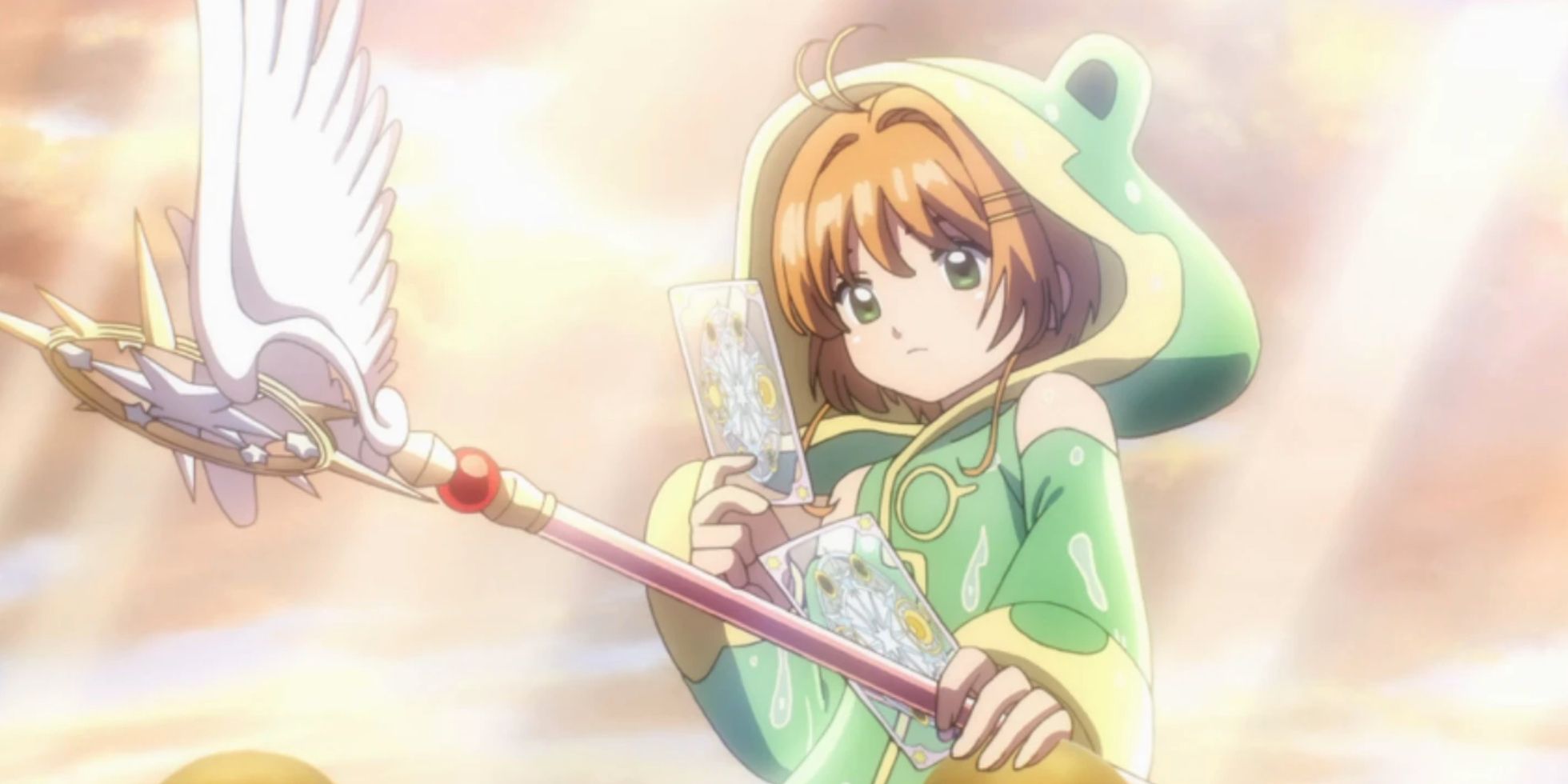Sakura gains a new card while wearing her frog costume in Cardcaptor Sakura Clear Card