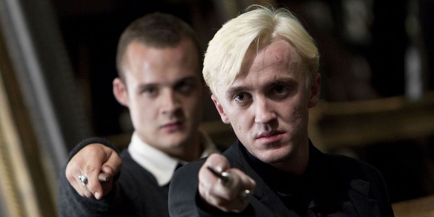 Draco Malfoy with his wand drawn in Harry Potter.