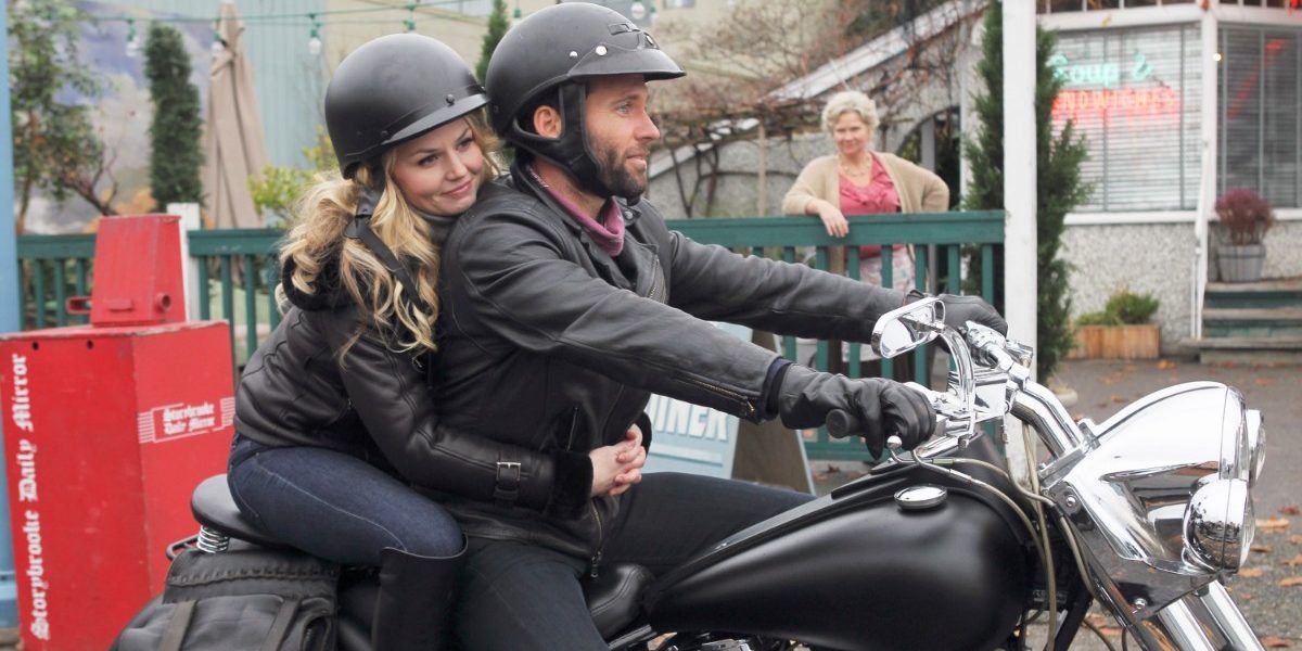 Emma rides on the back of August's motorcycle in Once Upon A Time.