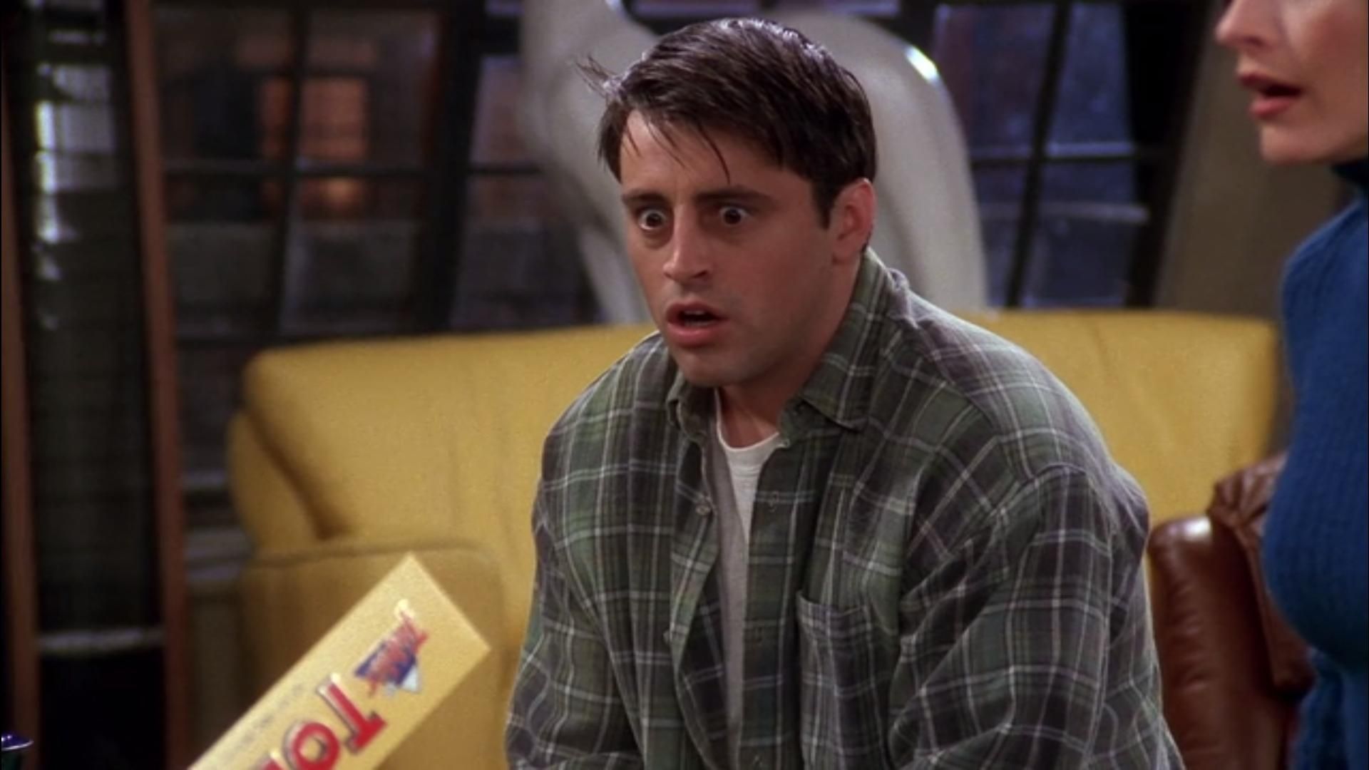 Joey parecendo surpreso em Friends