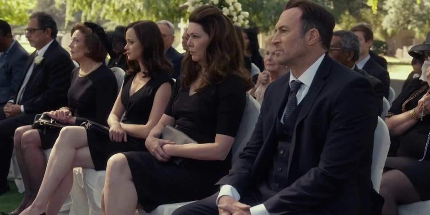 Emily, Rory, Lorelai, and Luke sitting at Richard's funeral on Gilmore Girls