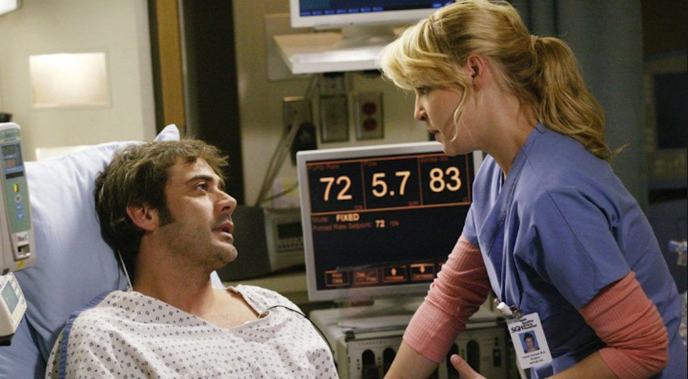 Izzie and Denny talking.