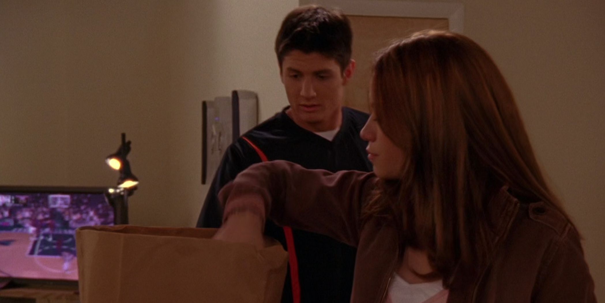 Haley brings Nathan groceries in One Tree Hill
