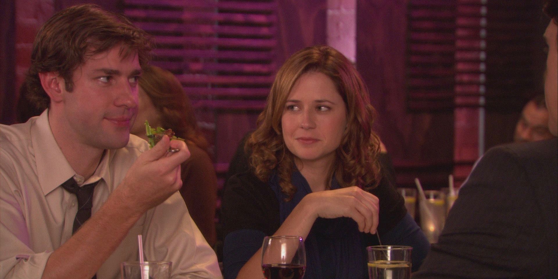 Jenna Fischer and John Krasinski as Jim and Pam in a restaurant in The Office