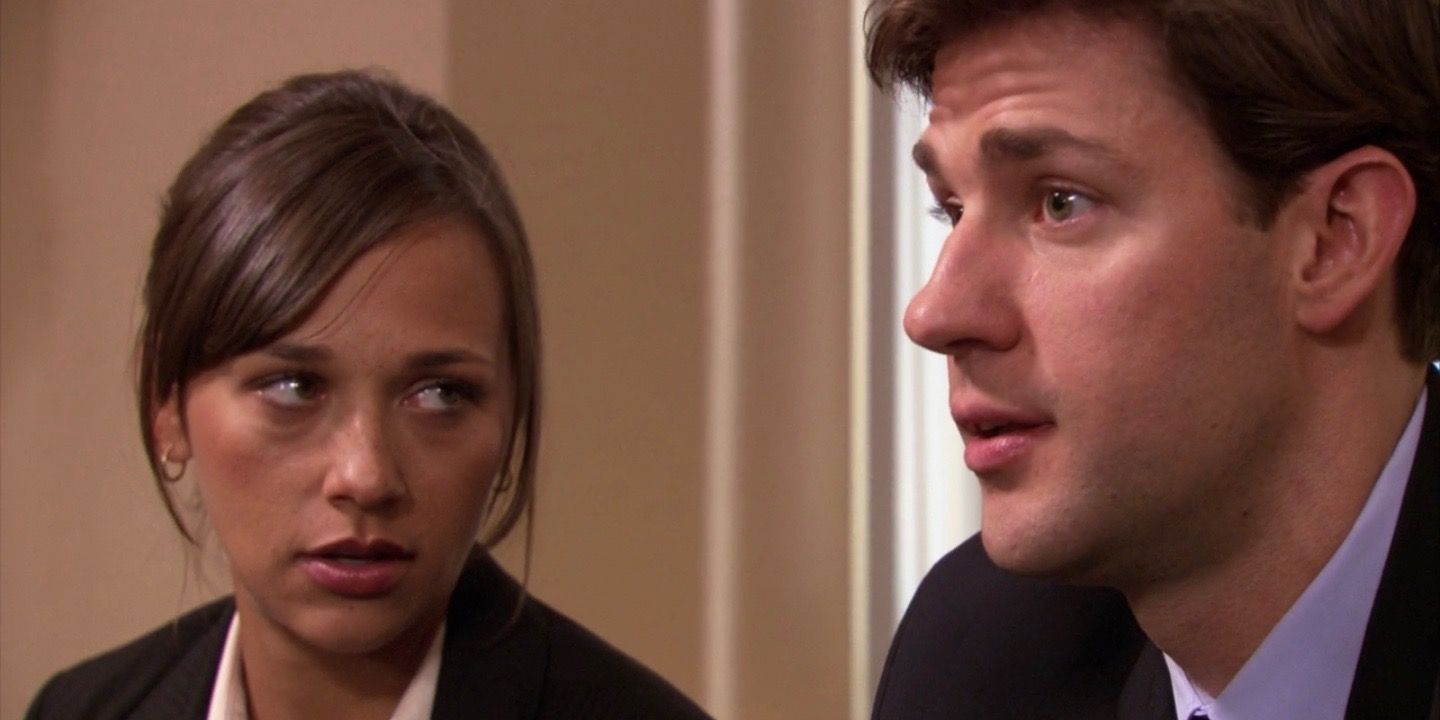 Karen looks at Jim while they wait for the interview on the office