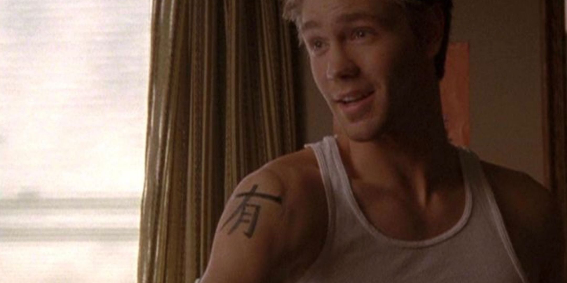 Lucas has a tattoo on his arm in One Tree Hill