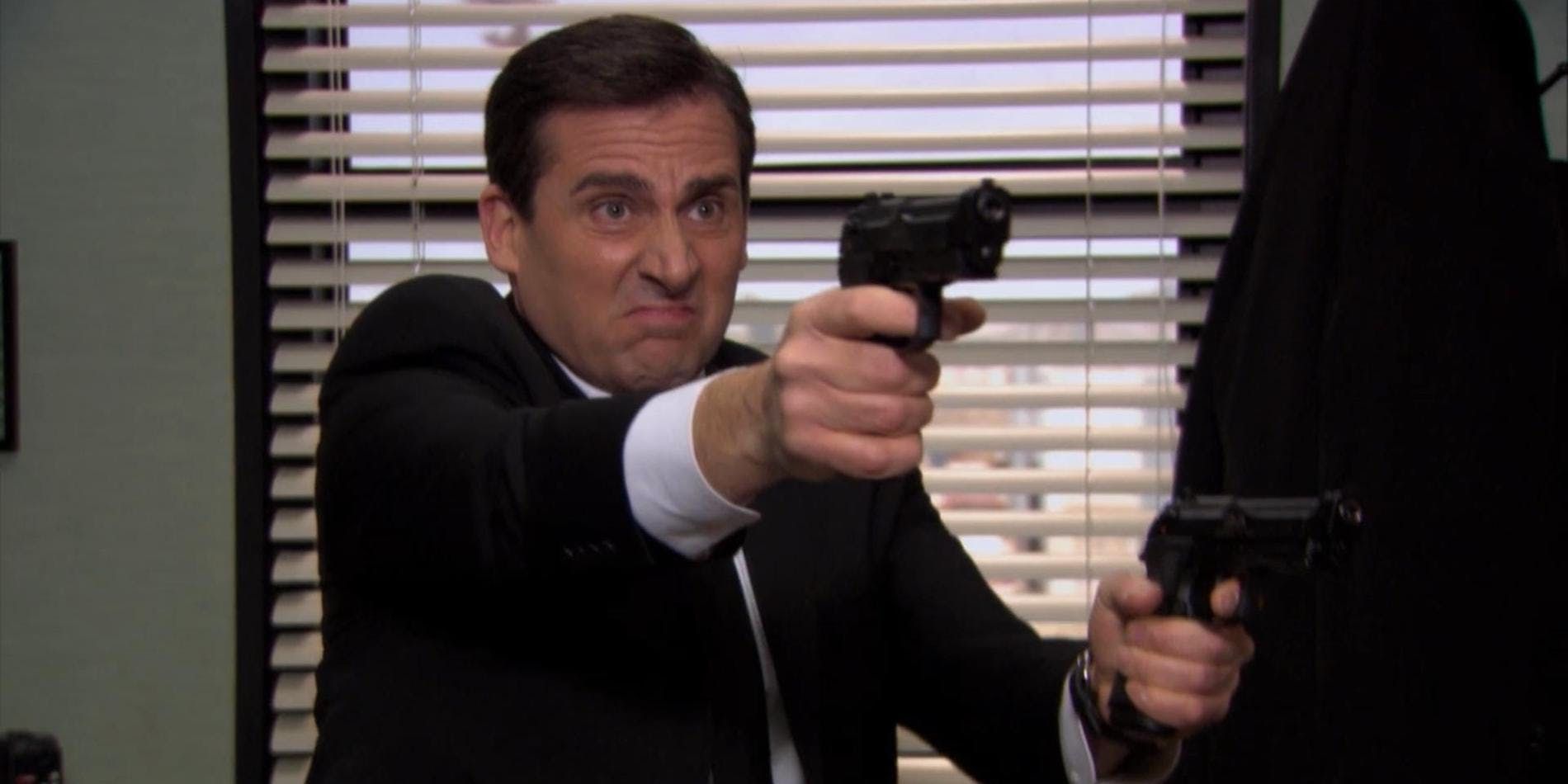 Michael Scott shooting guns in The Office