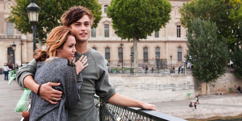 Miley Cyrus and Douglas Booth in LOL