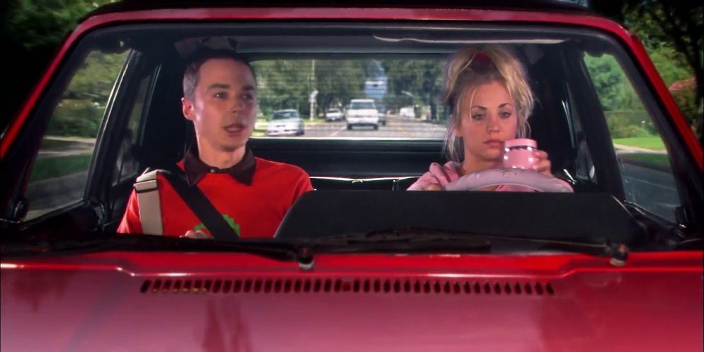 Penny driving Sheldon Cooper in The Big Bang Theory