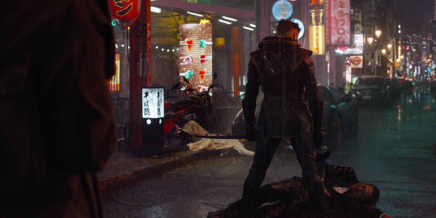 Clint Barton stands over Akihiko in the middle of the street in the rain in Avengers: Endgame