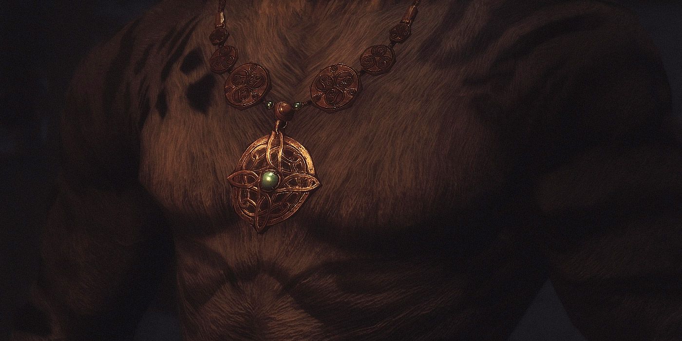 A close up of an Amulet of Mara from Skyrim